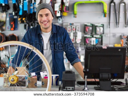 Salesman in bicycle shop