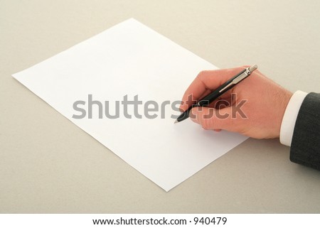 Businessman's Hand Signing a Contract