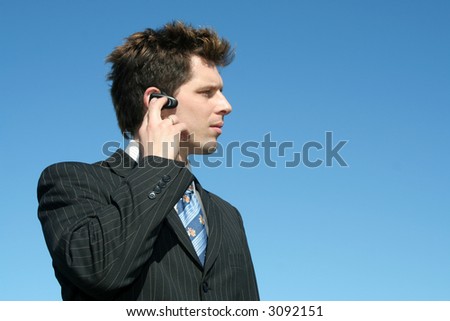 Businessman Using a Hands Free Device