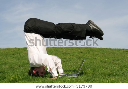 stock-photo-businessman-upside-down-using-laptop-3173780.jpg