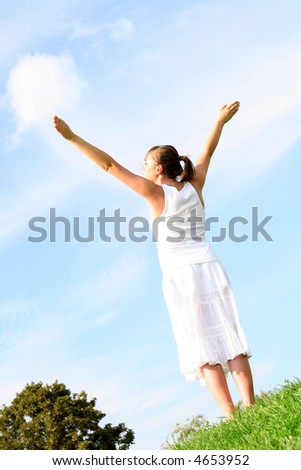 Woman with arms outstretched