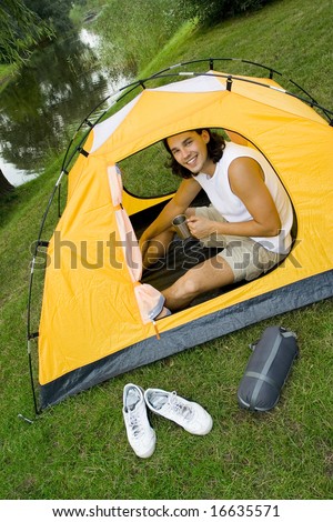 Man camping in tent