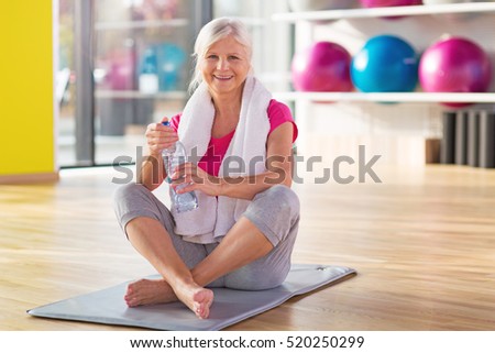 Senior woman at the gym