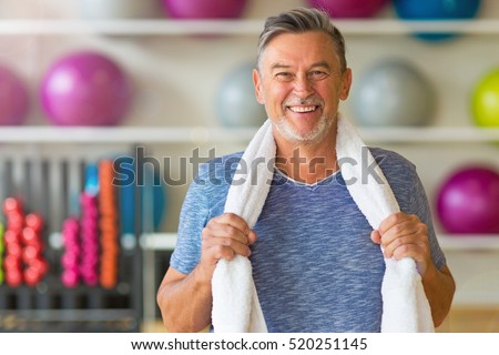 Senior man in health club