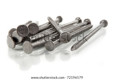 stock photo : Close and low of a small pile of steel ring shank nails
