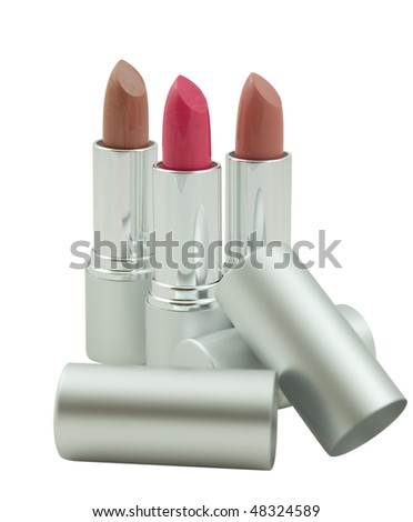 Three open lipsticks in metallic tubes isolated on a white background