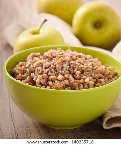 buckwheat porridge and green apple - diet concept