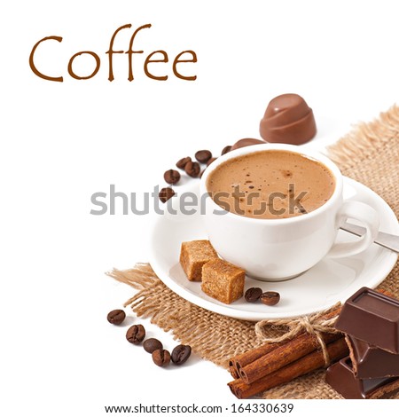 Closeup cup of italian espresso with cinnamon, coffee beans, brown sugar and chocolate  isolated on white background