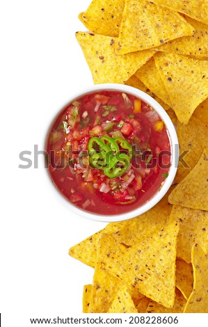 nachos and fresh salsa dip on white background