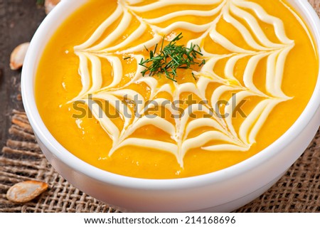 Cream of pumpkin soup with sour cream sauce