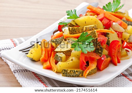 Roasted vegetables - zucchini, tomatoes, carrots, onions and paprika