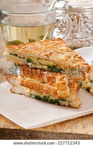 Warm toast with cheese and spinach for breakfast