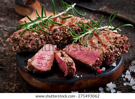 Juicy steak medium rare beef with spices