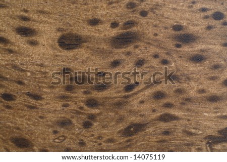 Wood background with knots and wavy texture