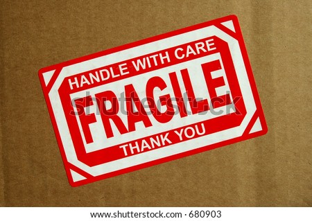 Handle with Care, Fragile sticker on cardboard box