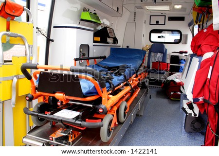 Ambulance interior details. Emergency equipment and devices visible