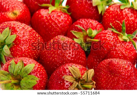 Macro shot of strawberries piled up