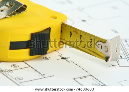 A measuring tape on a drawing
