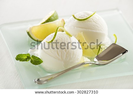 Fresh lemon and lime ice cream served on a plate.