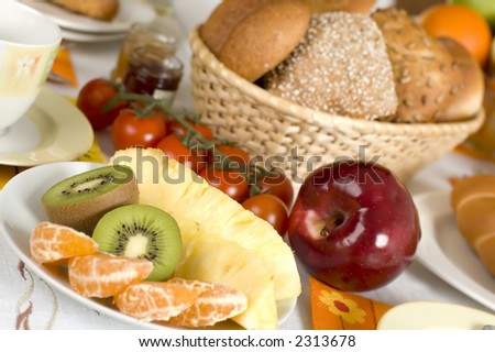 fruits, coffee and bread for breakfast close up