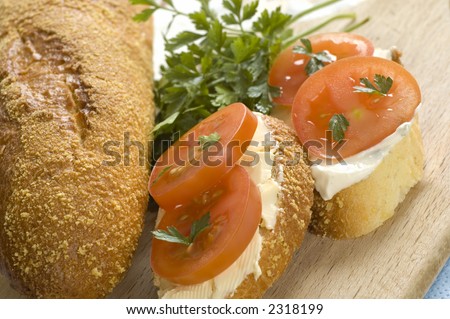 small sandwich with fresh tomato close up
