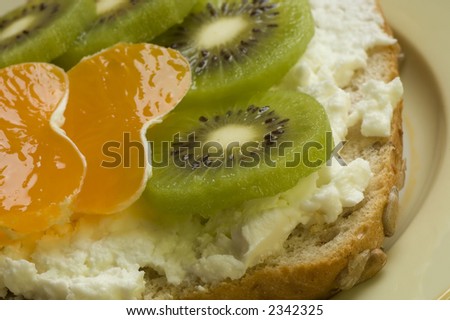 snack  with curd, mandarin and kiwi fruit close up