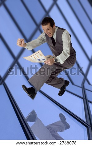 business men jumping with newspaper in hands - success concept
