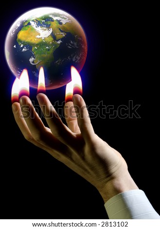 hand and planet earth global warming concept