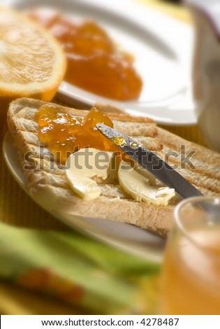 toast with apricot jam and butter close up shoot