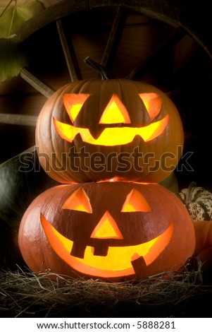 carved halloween pumpkins at night close up shoot