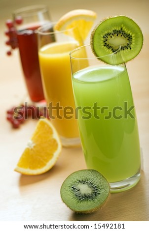 fresh natural kiwi juice in focus close up