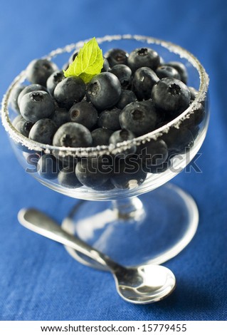 fresh blue berries in glass close up
