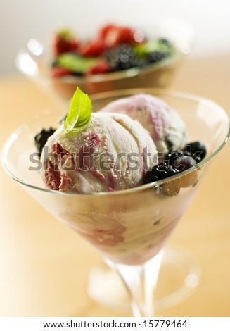fresh mixed ice cream with berries close up