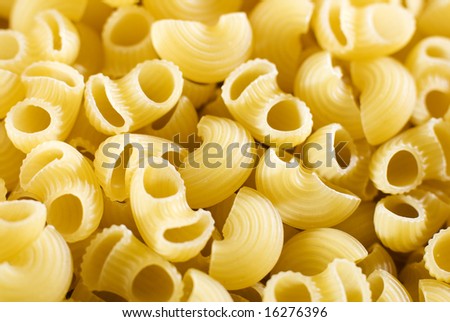 raw macaroni pasta background close up shoot