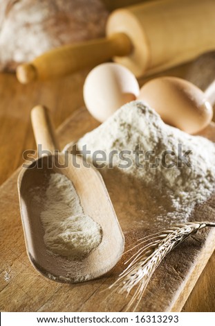 flour an eggs on board close up shoot
