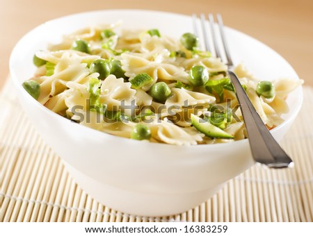 fresh italian pasta with peas and pumpkin