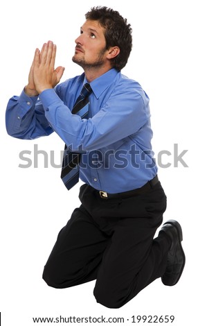 stock-photo-young-business-man-on-his-knees-praying-19922659.jpg