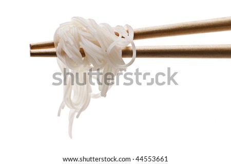Chopsticks holding oriental noodles isolated on white