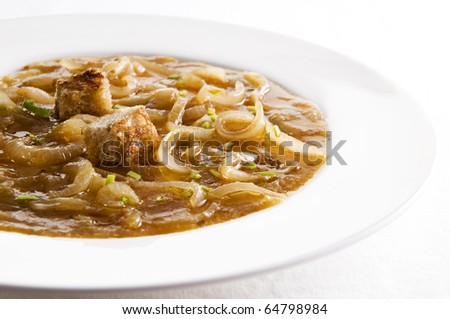 Fresh traditional french onion soup close up