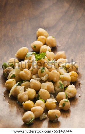Fresh chickpea salad in a bowl close up shoot