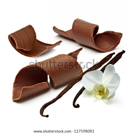 Chocolate Curls With Vanilla Beans On White Background