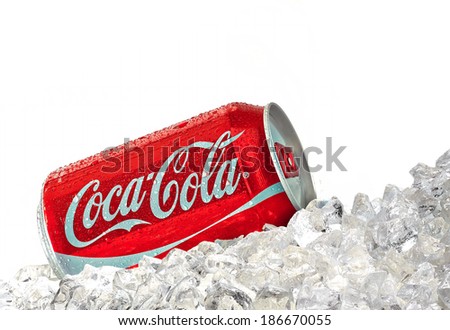TURKEY - April 11, 2014: Classic Coca-Cola Can with water drops on ice in close up. Coca-Cola is one of the worlds favorite beverages.