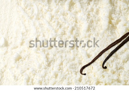 Vanilla ice cream in plate with vanilla beans