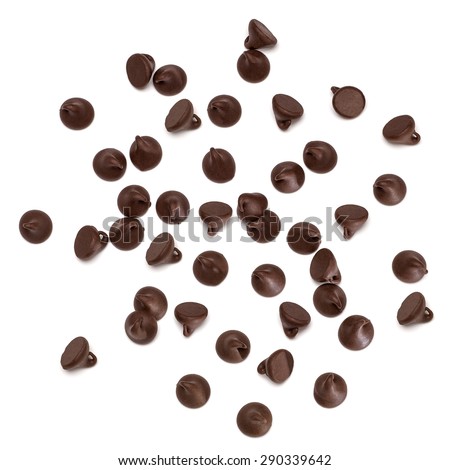 Chocolate morsels spread on white background from top