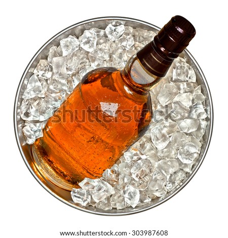 Whiskey bottle in ice bucket top view on white background including clipping path