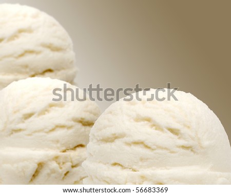 Three scoops of vanilla ice creams with bokeh
