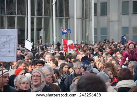 BRUSSELS - JANUARY 11: Silent march in support of free speech and against hate on January 11th, 2015 in Brussels, Belgium. 20000 persons participated.