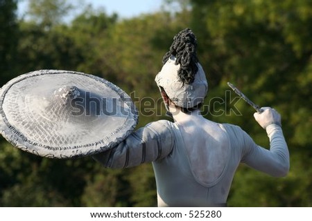 ancient fighter with knife and shield