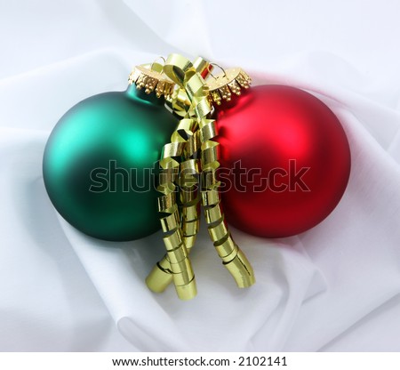 Red and Green Christmas Balls on White with Gold Ribbons