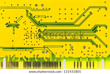 Close up of a yellow computer microcircuit